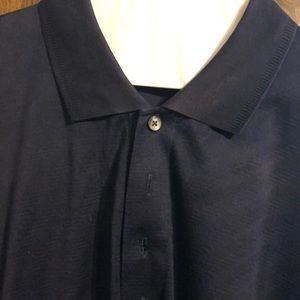 4 button polo by Descente